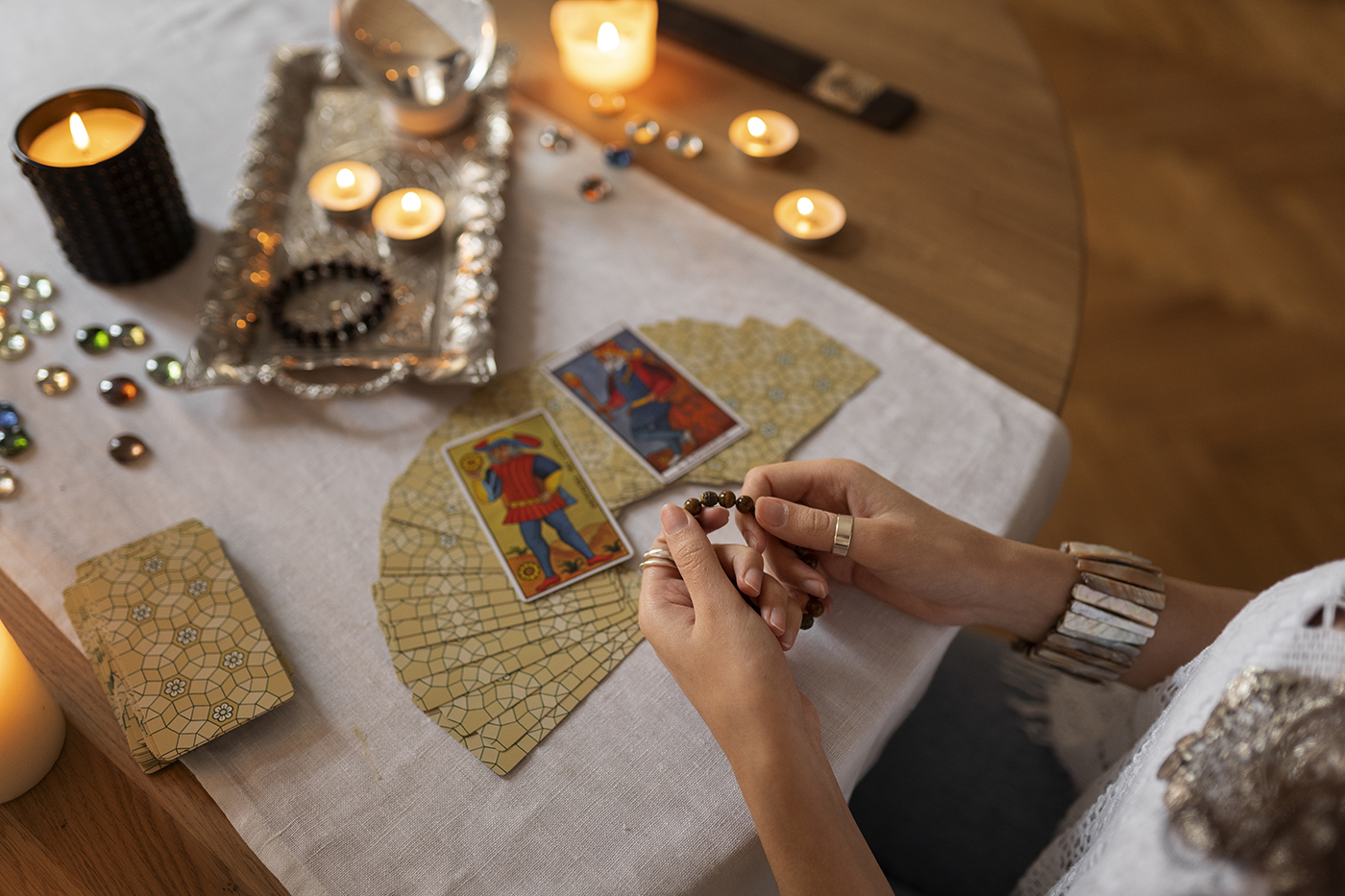 high-angle-woman-reading-tarot